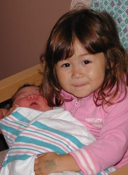 Natalie LOVES Holding the Baby