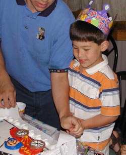 Checking out the cake